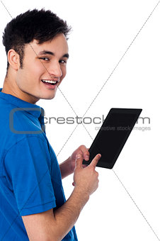 Smart guy holding touch pad