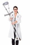 Female doctor displaying a set of crutches