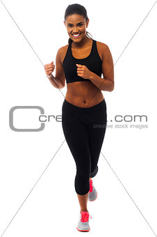 Fit female jogger, studio shot