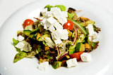 Summer salad with toppings of feta cheese