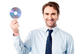 Manager showing compact disc