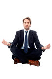 Smart businessman doing meditation