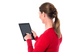 Smiling woman operating touch pad device