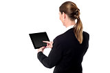 Business woman using a tablet device