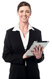 Corporate lady working on tablet device