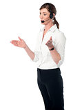 Female executive explaining, hands movement