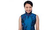 Young attractive chinese woman in blue dress