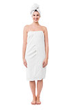 Spa woman wrapped in white towel