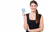 Attractive woman displaying her credit card