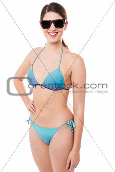 Sexy bikini model passing smile to you
