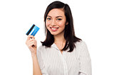 Attractive model displaying credit card