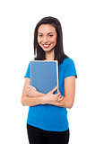 Smiling young confident student holding notebook