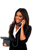 Charming businesswoman attending client's call