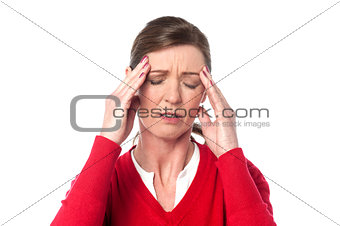 Middle aged woman having headache
