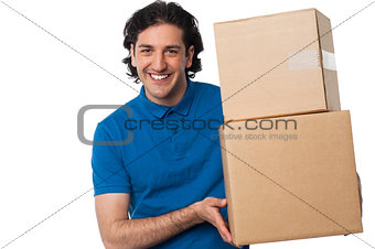 Man carrying couple of cardboard boxes