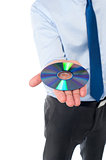 Man showing compact disc, cropped image