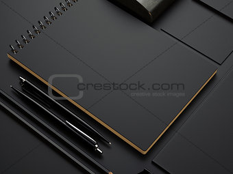 black branding elements on black paper background