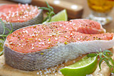 Raw red salmon steaks