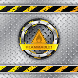Flammable warning sign on metallic plate