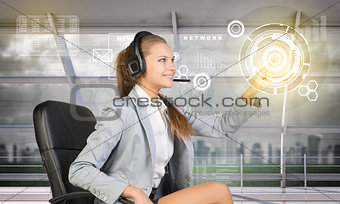 Young woman pressing on holographic screen
