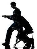 hands arms massage therapy with chair silhouette