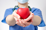 Doctor holding a heart