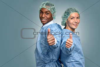 African doctor and nurse giving thumbs up