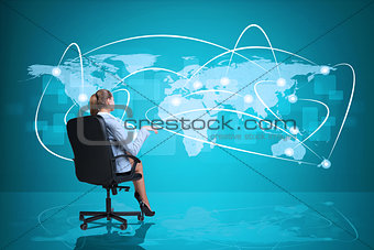 Rear view of businesswoman sitting in chair