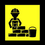 builder with brick wall icon