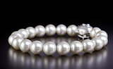 White pearls necklace on black
