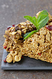 homemade muesli bars with cranberries, nuts and chocolate