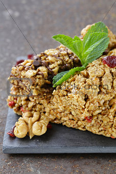 homemade muesli bars with cranberries, nuts and chocolate