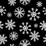 White snowflakes on black background