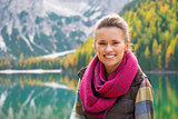 Portrait of a smiling woman on Lake Bries in the autumn