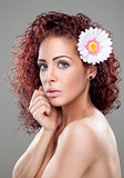 Beautiful woman with curly red hair