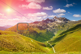 Colorful Alpine scenery with sun setting down