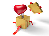 Surprise. The red heart jumps out of a golden gift box on a spring.