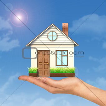 House on businesswomans hand
