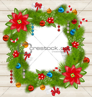 Christmas frame with traditional elements on wooden background