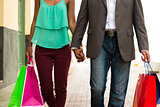 African American Couple Shopping With Bags In Panama City