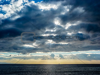 Sky with clouds over black sea