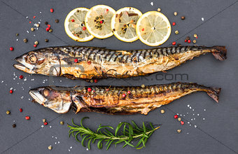 Baked Mackerel Fish with Herbs and Lemon on Stone