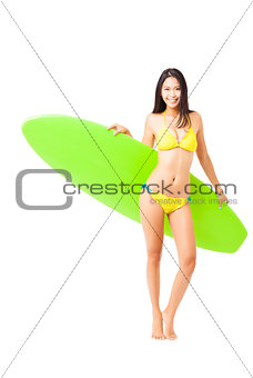 beautiful young Woman  holding surfboard