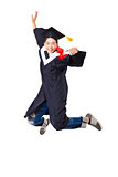 Happy  student in graduate robe jumping against white background