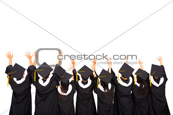 rear view Of  Students Celebrating Graduation