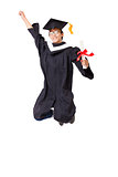 Happy  student in graduate robe jumping against white background
