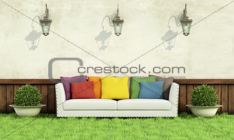 Garden with elegant sofa 