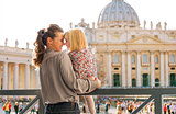 Eskimo kisses between mother and child at the Vatican in Rome