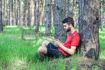 Boy under a tree