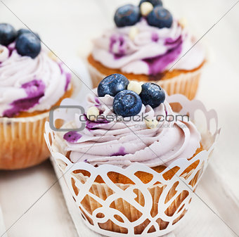 Set of tasty blueberry cupcakes